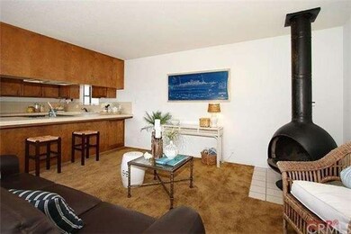 Open living to kitchen with a breakfast bar