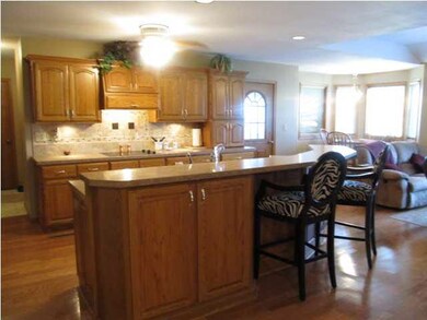 Huge kitchen with eating bar and step up breakfast
