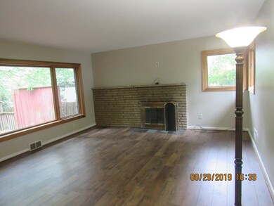 Living Room Offers Fireplace