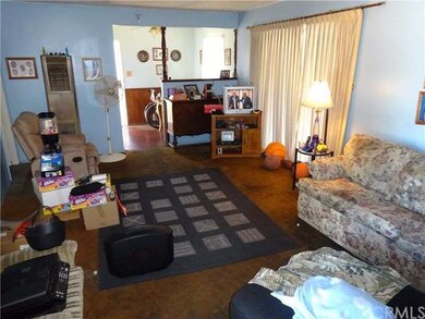Spacious Living Room with access to backyard, lead