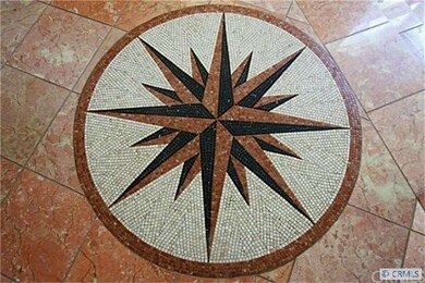 Beautiful Mosaic at the foot of the stairs in the 