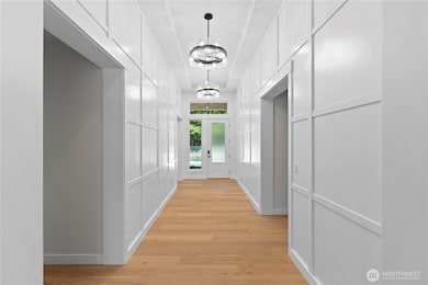 A Glamorous Entry Foyer sets the tone for this beautiful Home.