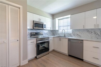 Kitchen featuring light hardwood / wood-style floo