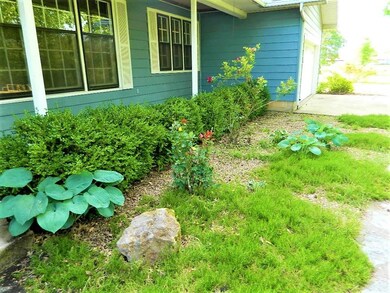 Nice landscaping and beautiful blooming trees and