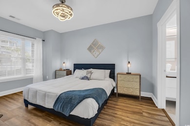 Bedroom with wood finished floors