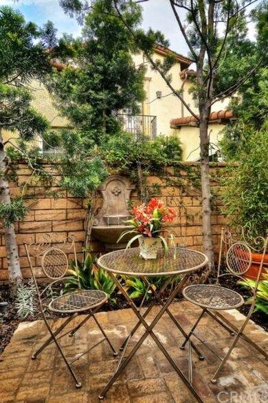 The front patio with gurgling fountain is perfect for an afternoon read.