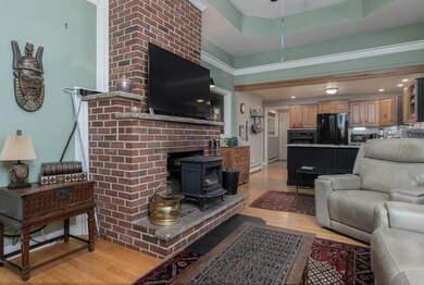 Family Room with woodstove in FPL