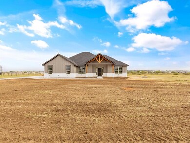 Custom home sits on over 1 acre with no known restrictions.