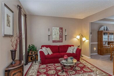 French door entry, left of foyer, into the front LR, sitting room and or office.
