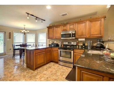 Kitchen. Gourmet kitchen with custom cabinets, gra