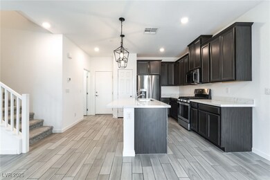 Kitchen with appliances with stainless steel finis