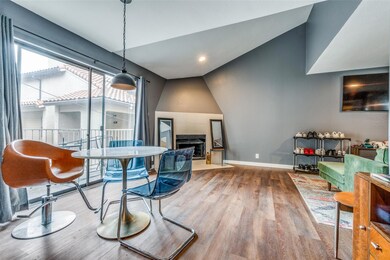 Dining area with hardwood / wood-style flooring an