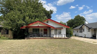 Bungalow-style house with covered porch and a fron