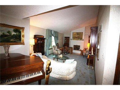 Large Living Room open to Dining Room. Yes Cosmeti