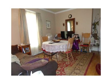 Living Room. Unit 1 Hardwood floor...