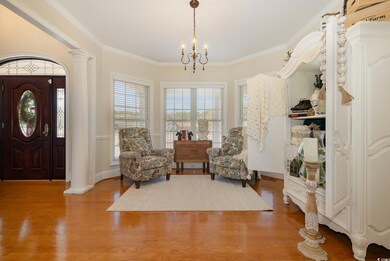 Interior space with an inviting chandelier, hardwo