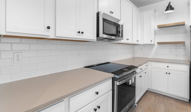 Kitchen with floating shelves