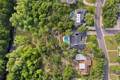 Aerial overview of property's location with a poo