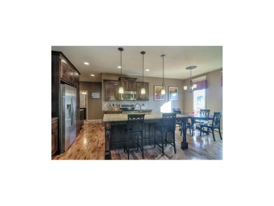 Gleaming hardwoods, stainless steel appliances, gr