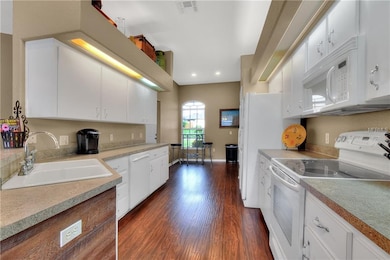 Breakfast table space in kitchen with front window