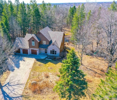 Drone / aerial view featuring a forest view
