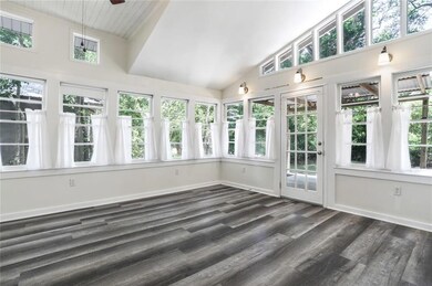 Bedroom in left rear  of home overlooks back yard