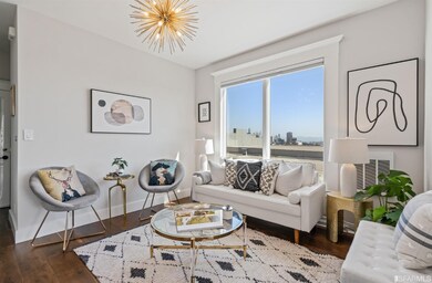 Living room featuring large, oversized windows wit
