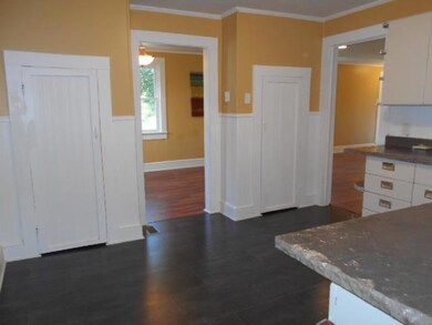 Nicely sized kitchen features a gorgeous tile, new STONE counter tops, and fresh paint!