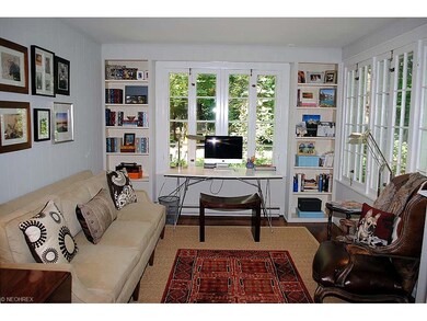 OFFICE/DEN HAS TWO WALLS OF WINDOWS, WOOD FLOORING