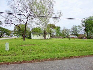 LOOKING AT PROPERTY FROM SIDE STREET