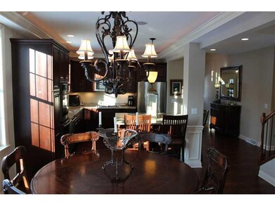 Kitchen. Handsome cherry cabinitry embellishes the