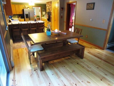 Casual dining space just off the...