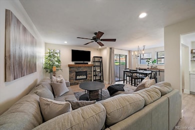 Open-concept space with new light wood LVP flooring and fresh paint throughout.