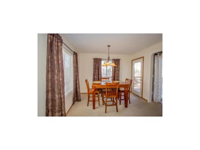 Dining room walks out to oversized deck.