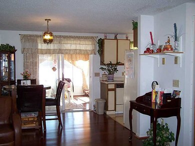 View. Slider to sunroom off dining area
