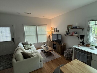 Living area featuring wood finished floors