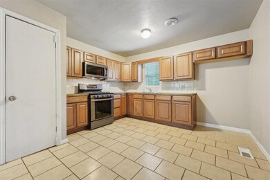 Kitchen with stainless steel appliances, tasteful 