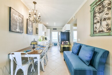 Tile floors throughout the living, dining, and kit