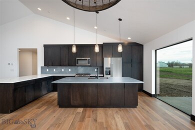 Kitchen w/ Solid Quartz Backsplash and Countertops
