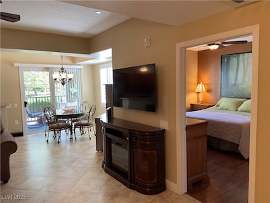 View near front door with bedroom on right and din