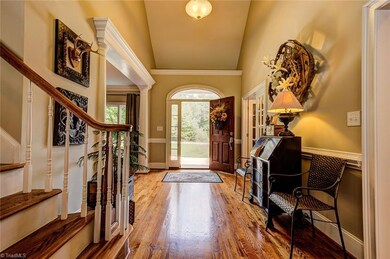 The elegant entry opens to a formal dining room and main level office. Gorgeous hardwood floors and lovely natural light.