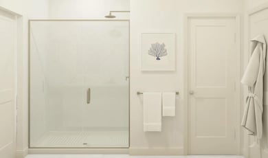 Primary bath with glass shower enclosure
