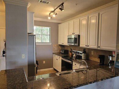 910 Charo Pkwy unit 323, Davenport, FL 33897 - photo 2