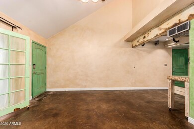 Main living area and front entry door