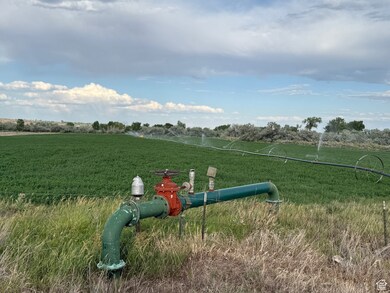View of home's community with a view of countryside and a lawn