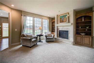 Charming Great Room with Wall of Windows, Built-in