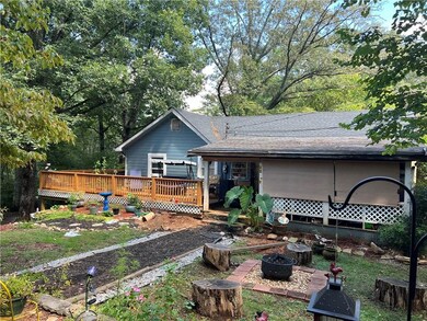 Back of property featuring a deck