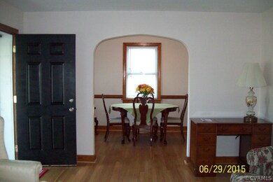 Lovely arched doorways look into the formal dining