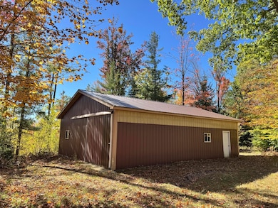 568 N Weaver Rd, Fairview, MI 48621 - photo 7