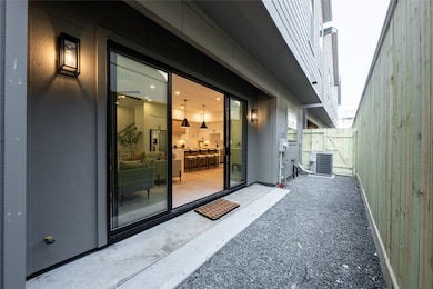 The outdoor patio features a oversized double slid